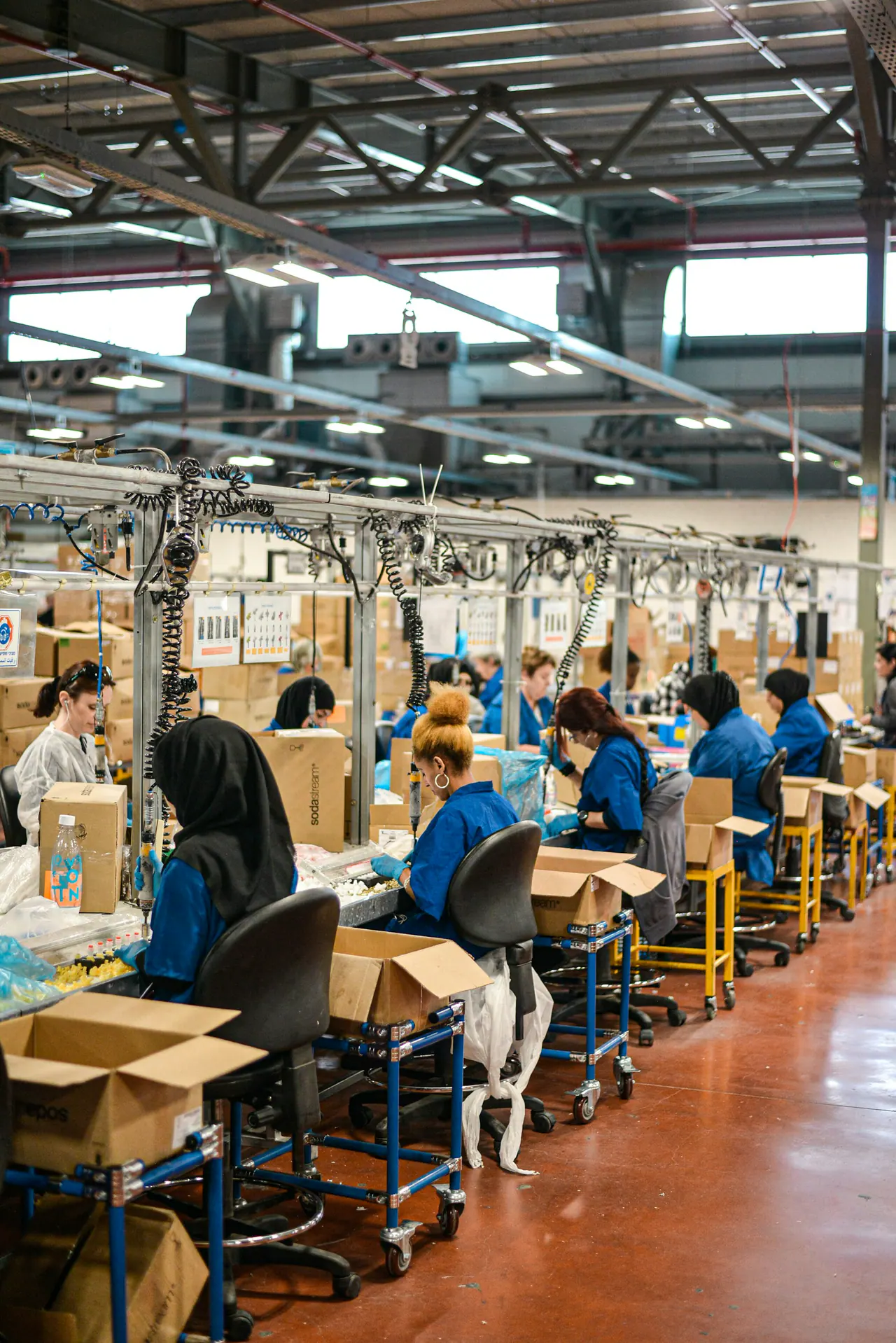 Production team working together in a manufacturing facility